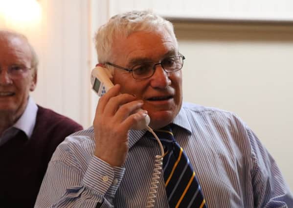 Alan Humphries, chairman of the Harmston Memorial Hall Trustees, sending and receiving the message of peace. EMN-170929-234938001