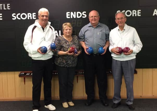 Andy Thompson is pictured with Judith Moody (event organiser), Jim Green (club chairman) and Doug Wells (club president), all holding a selection of the new bowls the club has available for new members to try out.