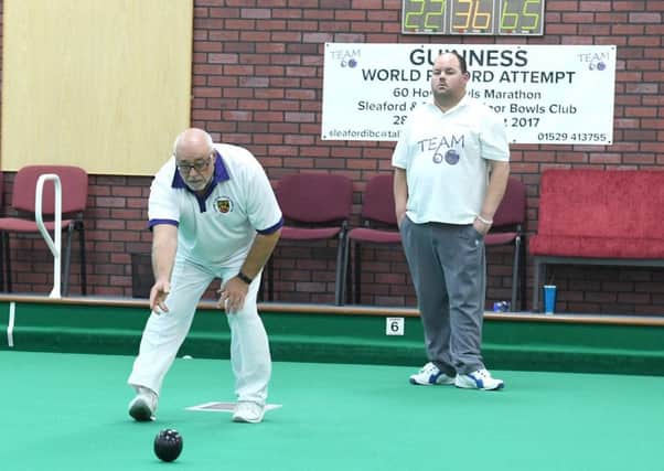 Sleaford Indoor Bowls Club members taking part in a world record attempt. Michael Baker (left) and Paul Roberts. EMN-170310-103156002