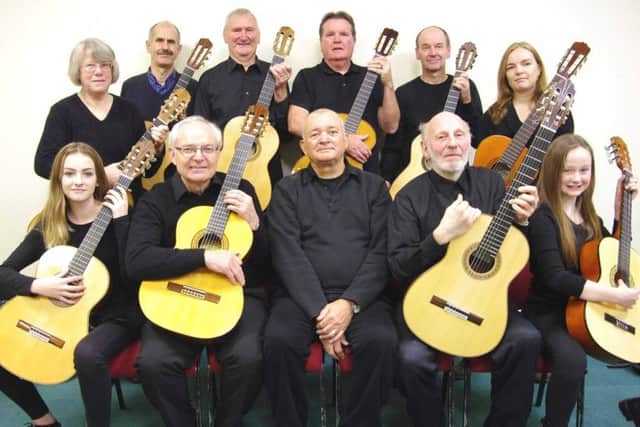 Members of The Solo Classical Guitar Ensemble of South Lincolnshire. EMN-170310-121550001