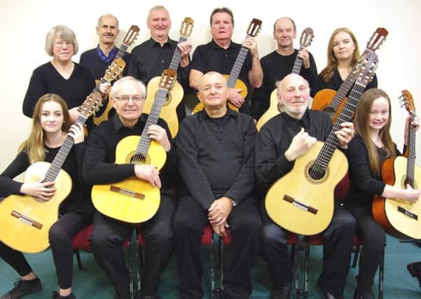 Members of The Solo Classical Guitar Ensemble of South Lincolnshire. EMN-170310-121550001