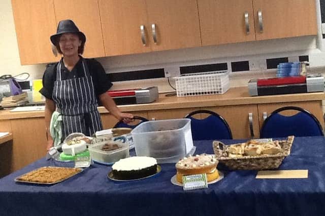 Julie Gray judging the bakes at Seathorne Primary School near Skegness. ANL-170410-152455001