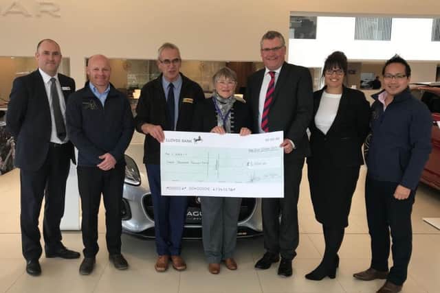 Andrew Shaw of Duckworth (third left) presents a cheque to Geoff Crawforth and Anne Crawforth of Lincolnshire and Notts Air Ambulance Also pictured are Pete Chapman of Skegness Round Table and Kristen Jones from Duckworth (left) and Sarah Melland of Duckworth and Skegness Round Table chairman Che Shing Li. ANL-170910-144334001