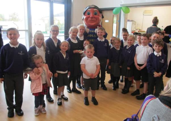 The Jolly Fisherman joins pupils at Beacon Primary Academy for the Worlds Biggest Coffee Morning. ANL-170910-153546001