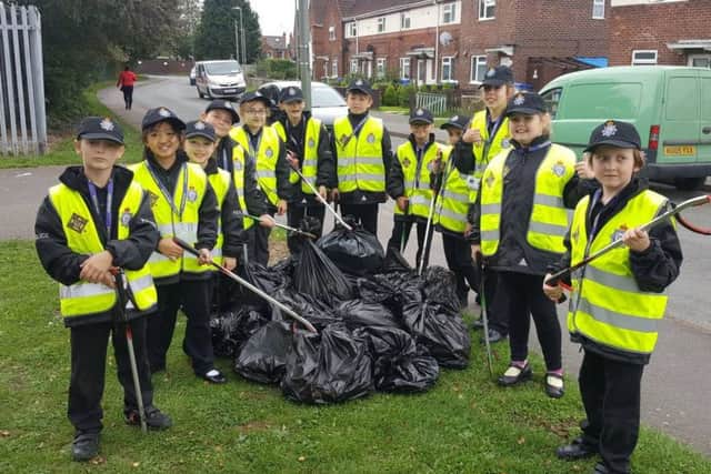 Mini Police from Carlton Road Academy litter picking. Photo: supplied.
