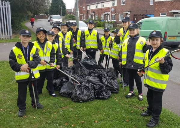 Mini Police from Carlton Road Academy litter picking. Photo: supplied.