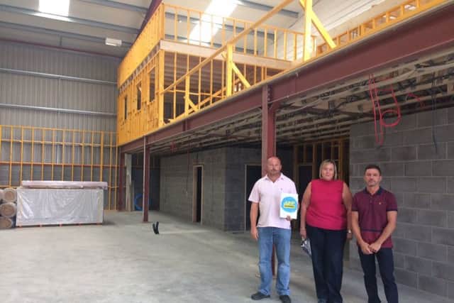 Jump Warriors backers Jonathan Graves and Nicholas Burton with Michelle Stott who has been employed as manager on the Wainfleet Road industrial estate in Skegness where work had already started. ANL-170510-153745001