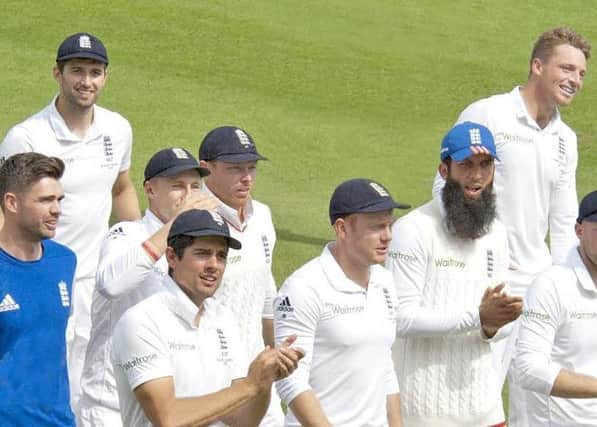 The victorious England players celebrate their Ashes win in 2015. Mark Wood (second left) and Jos Buttler (right) were notable omissions from the 2017 Ashes squad EMN-170910-120424002