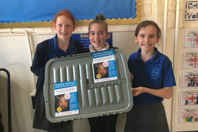 Caythorpe school children with the Lunettes Opticians and Vision Aid Overseas glasses collection box. EMN-170910-173028001