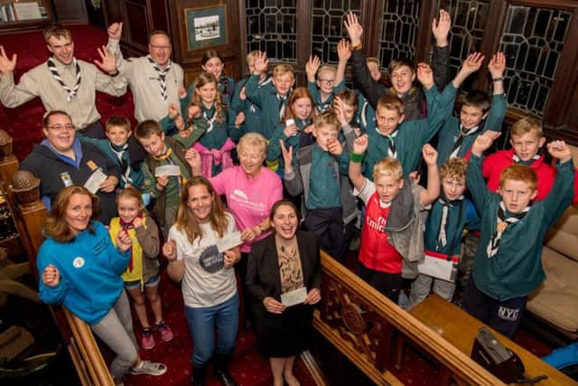 Representatives from local groups were deloghted to receive cash boosts from the beer festival proceeds EMN-171210-181643001