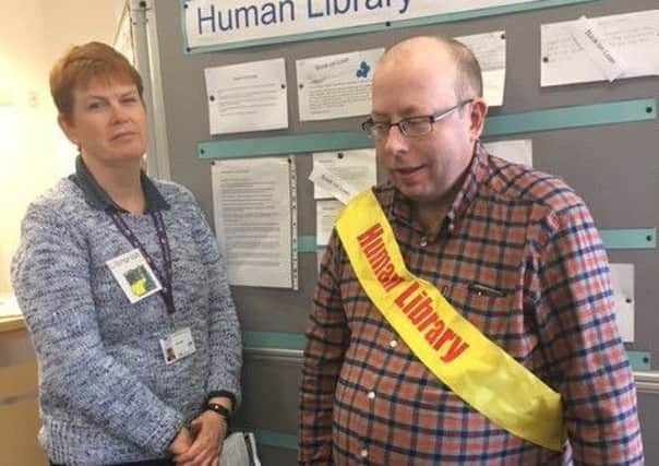 Pictured are supervisors Ann McGirr and Chris Wood at the Human Library event. EMN-171016-154300001
