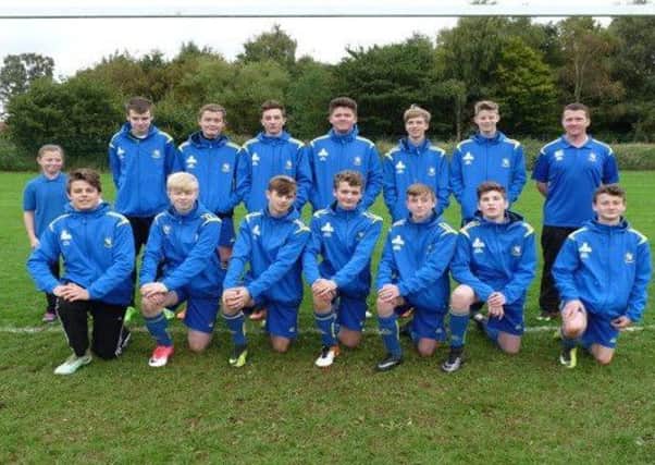 Market Rasen Town U16s in their new training tops courtesy of Caitlin  (back row, left) EMN-171210-113647002