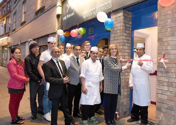 India Garden, Sleaford, becoming Gurkha 19, after Nadim Aziz sold up after 17 years. Mayor Jan Mathieson, officially opening Gurkha 19 with owner Netra Prasad Kandel. EMN-171210-165613001