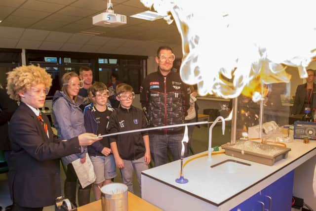 Year 7 student Teo Gordon carries out a science experiment in the new Louth Academy science lab.
