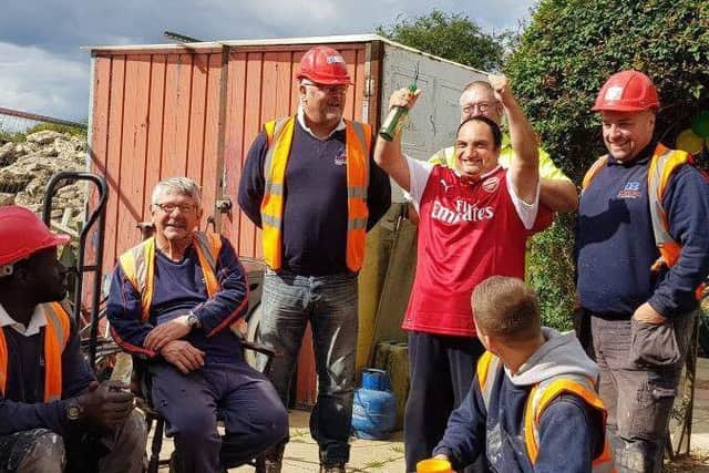 Stevie (centre) was joined by builders from the site to celebrate his birthday. EMN-171024-092816001