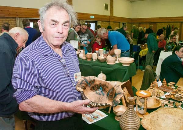 John Ingamells with one of his creations at the Lincolnshire Association of Wood Turners' annual open day.