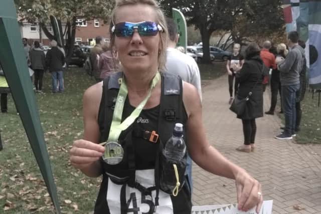 Paula Downing was the first lady to finish the Spires and Steeples marathon EMN-171023-170426002