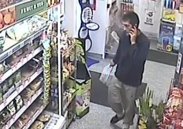 Do you recognise this man? Police say he may be able to help in an investigation into a store theft.