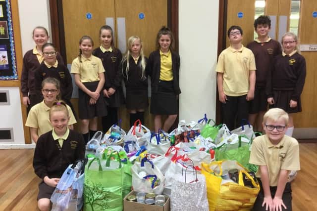 Skegness Food Bank is thanking the community for the harvest food that has been donated to help the needy. Skegness Richmond School ANL-171024-142346001