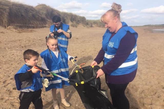 Leanne Smith and her children William, 9, Amelia, 7, and Henry, 4, joined the Skegness Aquarium beach clean. ANL-171025-150130001