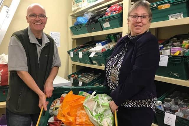The store room at the Storehouse food bank is bursting woth food after the harvest festival, but stock control volunteer Malcoln Fielder (left) and restore co-ordinator Debby Harland say more donations are needed. ANL-171030-131736001