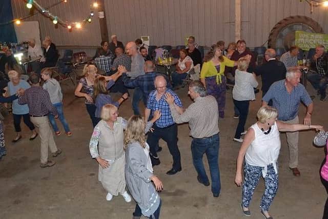 Pictured are some of the attendees enjoying the evening.Photo by: Rotarian Keith Butter.