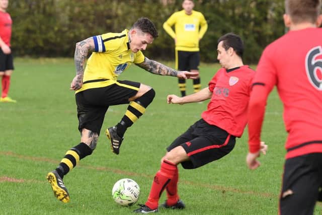 Grant Butler in action for Wyberton.