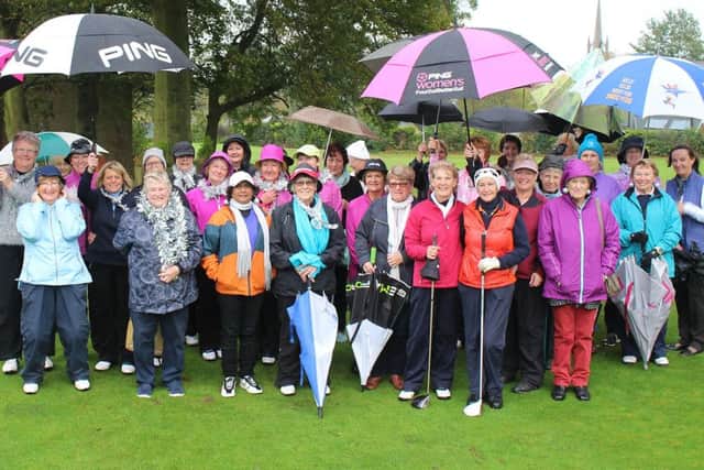 Golfers defied the rain to support the Lady Captains Drive-in EMN-171030-165753002