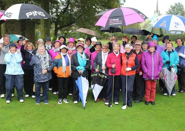 Golfers defied the rain to support the Lady Captains Drive-in EMN-171030-165753002