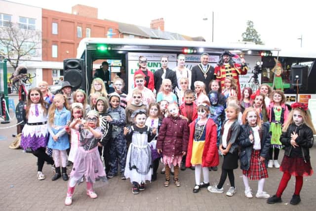 Only the brave joined members of the Top Limitz dance school as part of the Hildreds fright night celebration, including Shreks Halloween Grotto. Is that Mayor Danny Brookes and Town Crier Steve O'Dare? Photo: Kevin Healey. ANL-171031-091238001