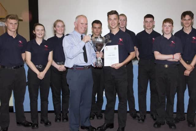 Public service students from St Georges Academy in Sleaford being presented with the trophy.