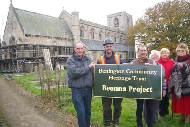 Trustees with Bonsers foreman Jamie outside the church. EMN-170211-160526001