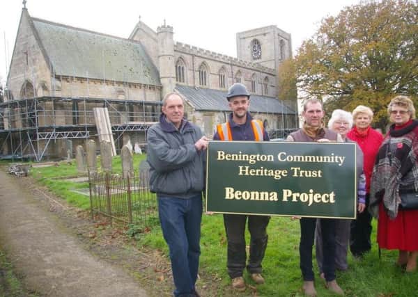 Trustees with Bonsers foreman Jamie outside the church. EMN-170211-160526001