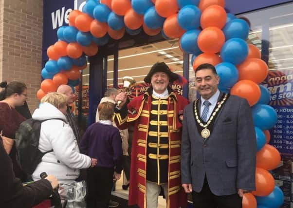 Mayor of Skegness Coun Danny Brookes and Town Crier Steve O'Dare declaring B&M in Skegness officially open. ANL-170311-120243001