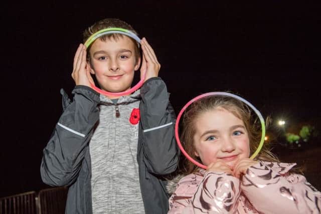 Let them glow. Fun at the Lincolnshire Aviation Centre fireworks display. Photo@ John Aron ANL-170211-164747001