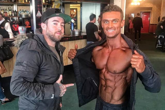 Joshua-Blue prepares to go on stage. Pictured with fitness photographer and good friend Alex Wightman.