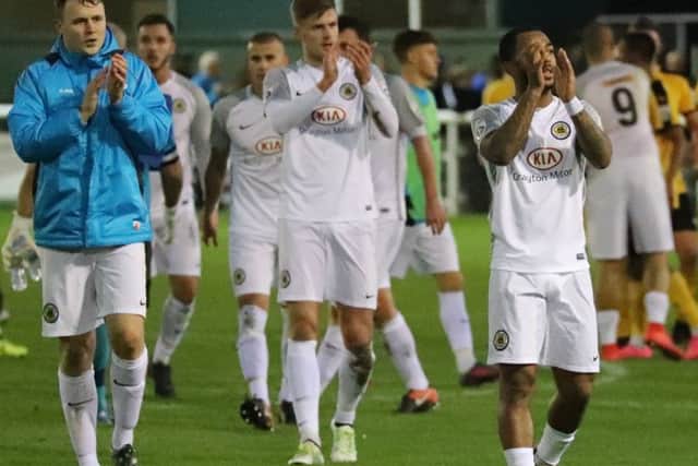 United celebrate their win at Leamington.