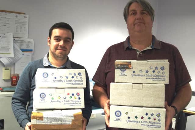 Louth reporter James Silcocks and content editor John Fieldhouse with just some of the boxes that you, our generous readers have already handed in.