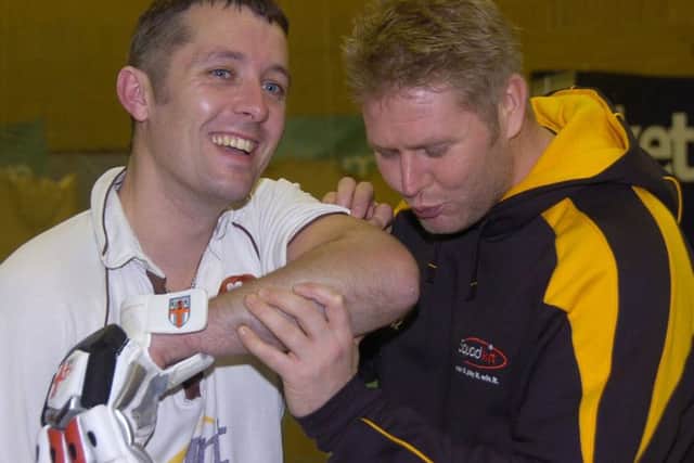 Former England bowler Matthew Hoggard leant a hand at the 2014 record attempt, pictured here with Dave Newman EMN-170611-175047002