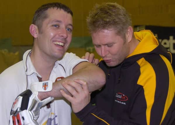 Former England bowler Matthew Hoggard leant a hand at the 2014 record attempt, pictured here with Dave Newman EMN-170611-175047002