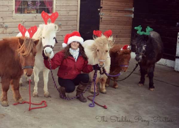 Leanne Maginnis, pictured with five of her six ponies.