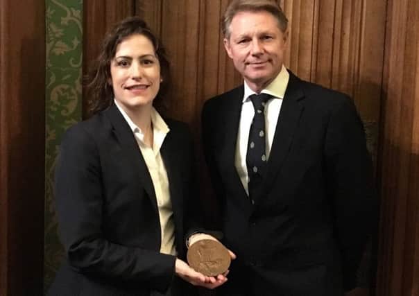 MPs Victoria Atkins and David Morris with the Dead Man's Penny belonging to Private Charles Edward Woodward from Spilsby who died in the First World War. ANL-170711-101116001