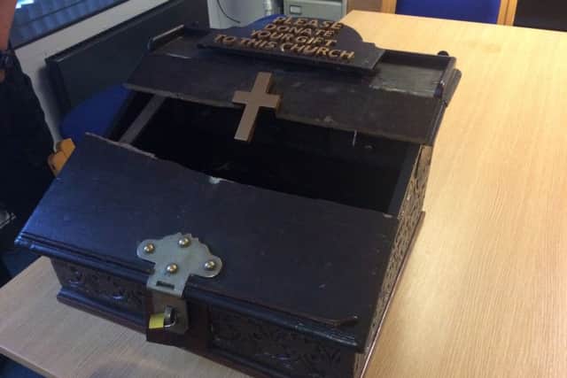 The damaged Stump donations box EMN-170711-104656001