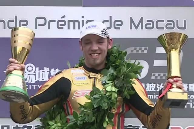 On the podium after last year's victory EMN-170811-150058002