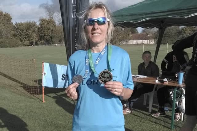 Paula Downing is now just 10 marathons shy of reaching her century EMN-170811-144733002