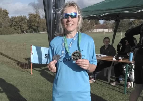 Paula Downing is now just 10 marathons shy of reaching her century EMN-170811-144733002