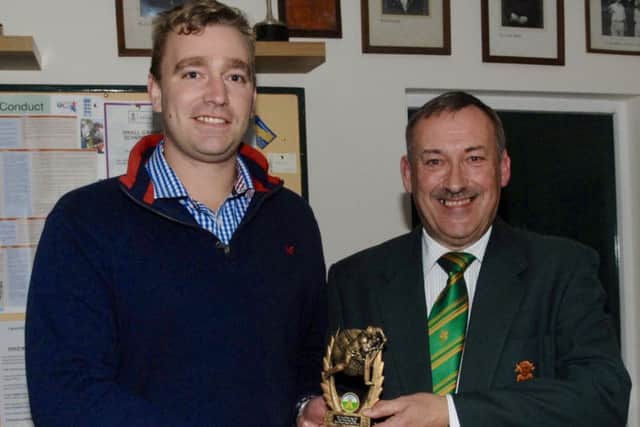 Lincolnshire County Cricket Club president John Van-der-Vord (right) presents the Premier Division batting award to Woodhall Spa's Matt Sergeant.