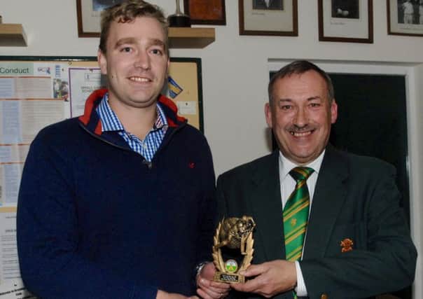 Lincolnshire County Cricket Club president John Van-der-Vord (right) presents the Premier Division batting award to Woodhall Spa's Matt Sergeant.