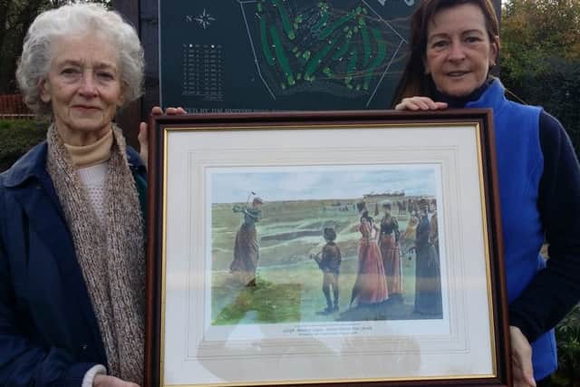 Louth GC lady captain Pam Hayden (left) and Rosemary Evans (B team captain with prize EMN-170911-144155002