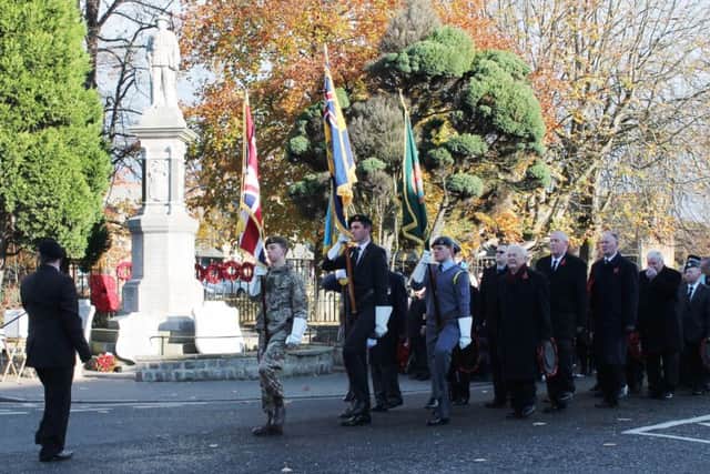 The front part of the main parade stopping off for the service at Louth War Memorial.